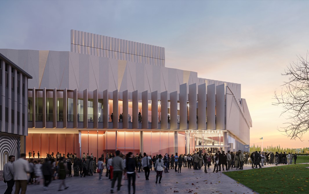 Image shows architecturally designed building with vertical panels, earthy colours with a forecourt full of people