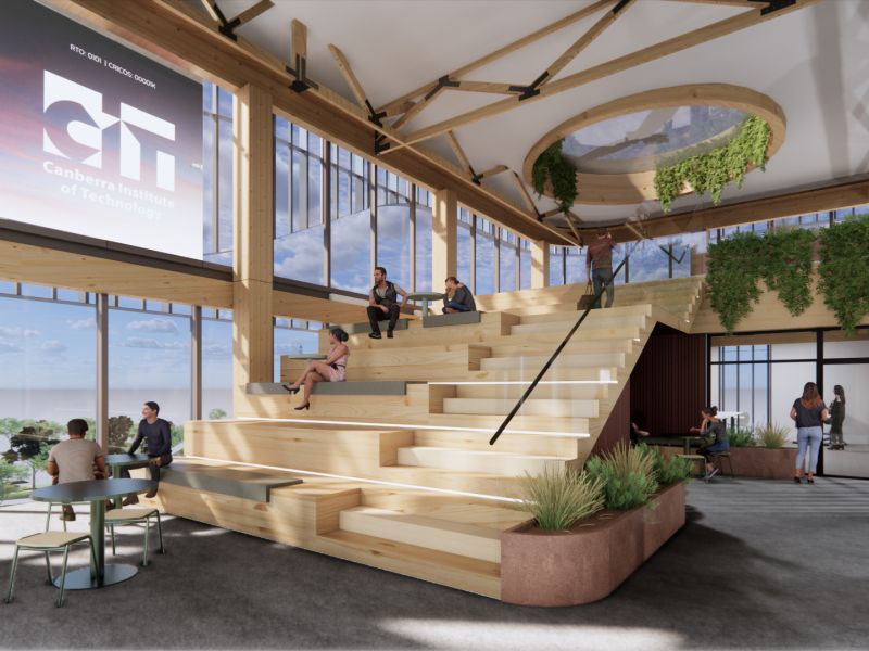 View of internal student commons area with bleachers